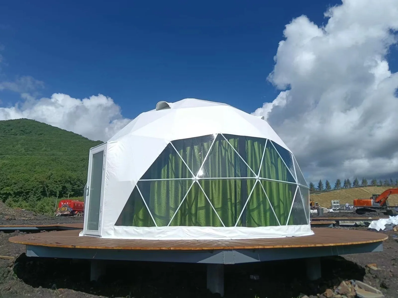 Manufacturer dome with panoramic front and timber platform; illustrative configuration